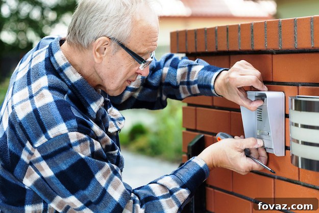 DIY Home Fixes Made Simple 2 Handyman repairing a doorbell