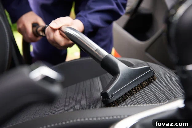 The Speedy Car Seat Cleaning Hack 2 Image of car seat being vacuumed