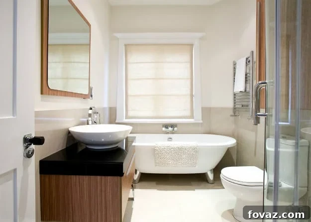 Functional and aesthetically pleasing bathroom with layered lighting and smart storage solutions for modern homesteads.