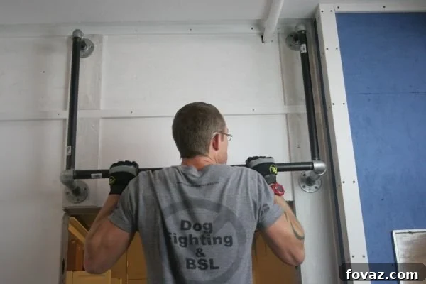 Man doing pullup | How To Make A Bombproof Pullup Bar | DIY Fitness | DIY Pullup Bar