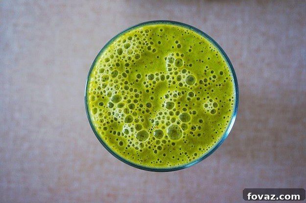 Elevate Your Asparagus: 15 Inspiring Recipes 2 Vibrant green smoothie with fresh asparagus and other healthy ingredients.
