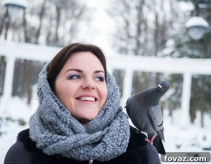 8sso-GVbt7E smiling woman wearing grey scarf | fall fashion trends 2020