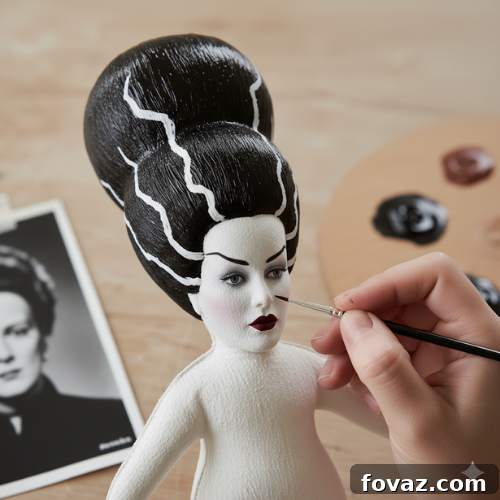 Sew Your Own Spooky Sweethearts Frankenstein Cloth Dolls 7 Tracing eyes, lips, and dramatic eyebrows onto Mrs. Frankenstein's face, preparing for detailed painting