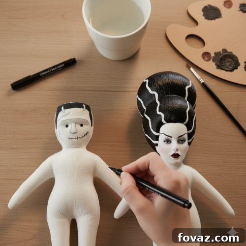 Sew Your Own Spooky Sweethearts Frankenstein Cloth Dolls 10 Painting Frankenstein's eyes and adding iconic black stitches to his forehead with a thin brush or marker