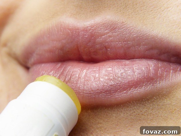 5 DIY Lip Savers for a Hydrated Pout 2 Homemade Healing Lip Balm with dried herbs and beeswax in small containers