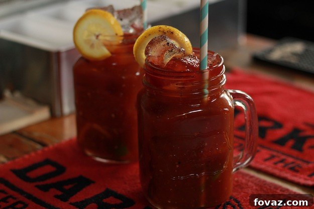Your Ultimate Brunch Upgrade: A DIY Bloody Mary Bar 2 Vibrant green Tomatillo Bloody Mary cocktail with garnishes